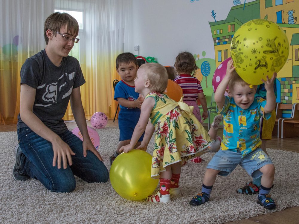 Children playing in a room at the Shchuchinsk Babyhouse